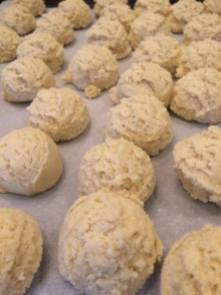 You'll be rolling the cookie balls in a cinnamon sugar mixture, preparing them all in advance helps.